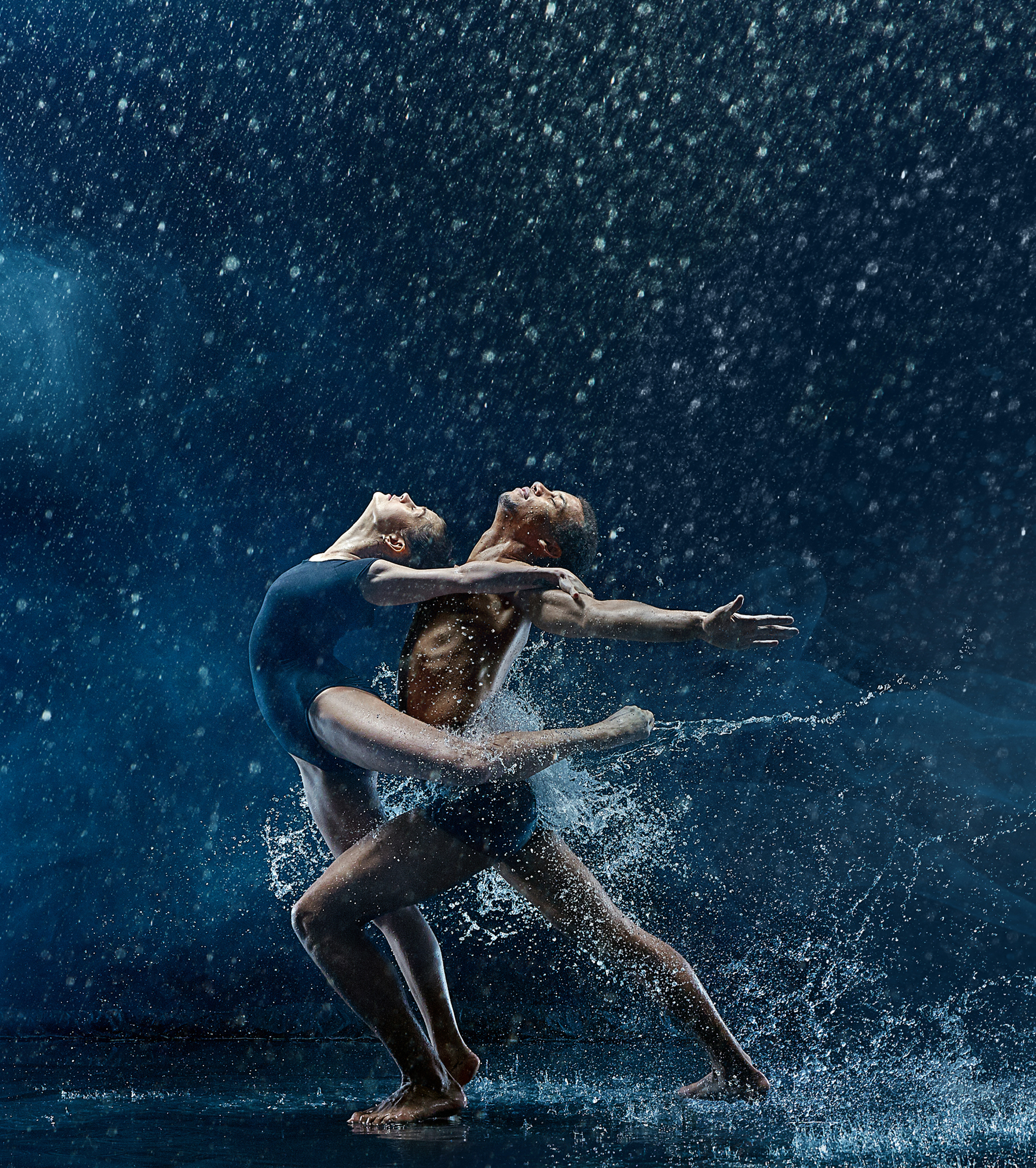 Couple Ballet Dancers Dancing Under Water Drops And Spray